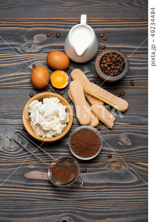 Ingredients for cooking tiramisu - Savoiardi biscuit cookies, mascarpone, cheese, sugar, cocoa 49234484