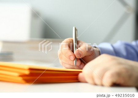 Businessman hold hand silver pen. Businessman hold hand silver pen. 49235010