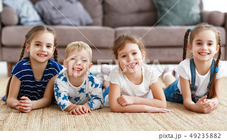 happy kids friends at home. 49235882