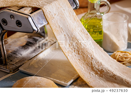 Fresh stretched dough Fresh stretched dough 49237630
