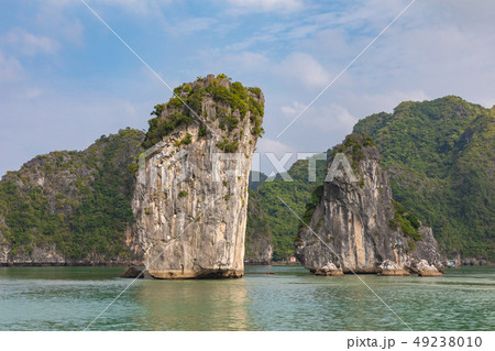Rock islands near floating village in Halong Bay, 49238010
