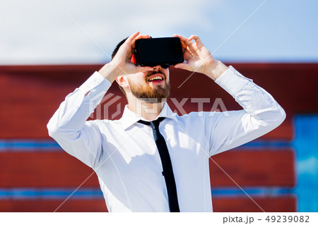 young businessman with VR glasses 49239082