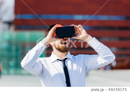 young businessman with VR glasses 49239173