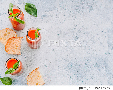 Gaspacho soup in glass bottles, copy space Gaspacho soup in glass bottles, copy space 49247575