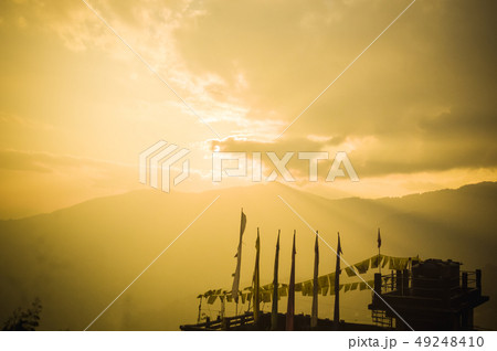 Buddhist flags at sunset panoramic view Sikkim Buddhist flags at sunset panoramic view Sikkim 49248410