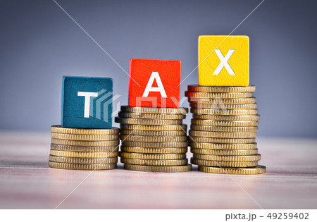 colorful cube with word TAX and stacking coin colorful cube with word TAX and stacking coin 49259402