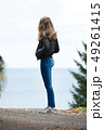 Lonesome girl at the ocean 49261415