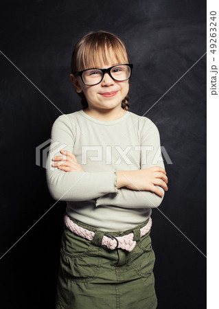 Mischievous child portrait. Happy kid girl  49263240