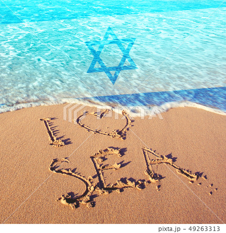 Beach sand, sea and flag Israel. I love Israel 49263313