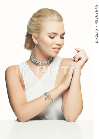 Young woman in jewelry portrait 49263645