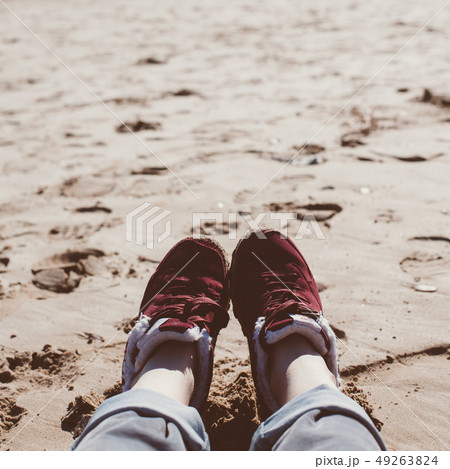 Girl relaxing on sand beach 49263824