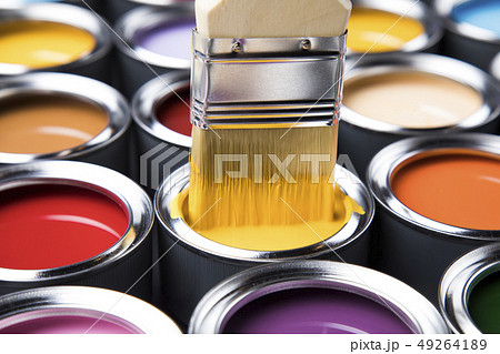 Paint brush, tin can and color guide samples 49264189