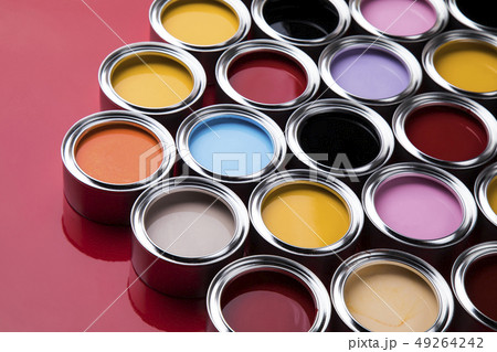 Group of tin metal cans with color paint 49264242