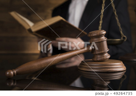 Judge, male judge in a courtroom striking the Judge, male judge in a courtroom striking the 49264735