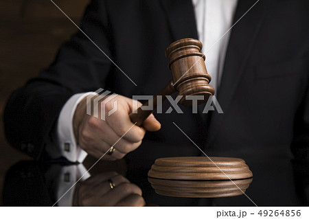 Judge, male judge in a courtroom striking the Judge, male judge in a courtroom striking the 49264856