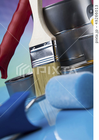 Metal tin cans with color paint and paintbrush Metal tin cans with color paint and paintbrush 49266013