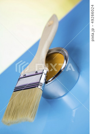 Paint can with a paintbrush Paint can with a paintbrush 49266024