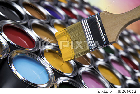 Tin cans with paint and brushes 49266052