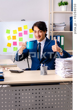 Young businessman working in the office Young businessman working in the office 49268050