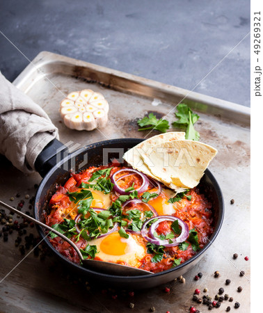 Shakshuka with pita bread 49269321