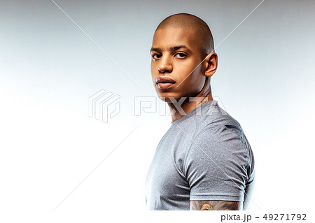 Sportive bold african-american man wearing sport t-shirt Sportive bold african-american man wearing sport t-shirt 49271792