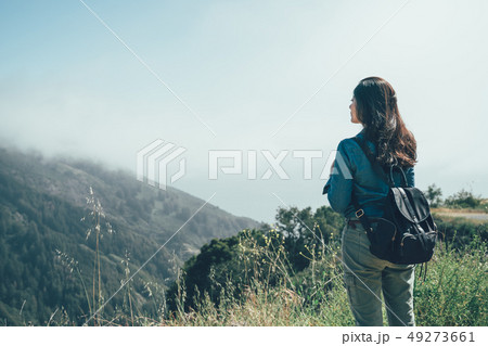 traveler enjoying nature view big sur with flog 49273661