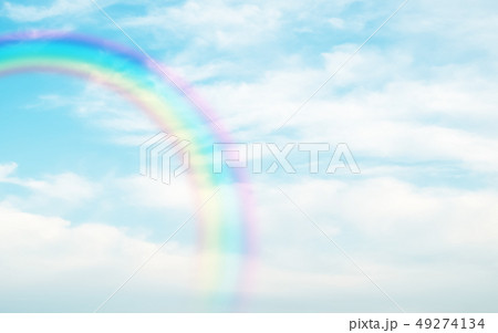 rainbow in cloudy sky 49274134