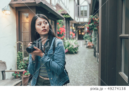 female exploring old urban carmel by the sea female exploring old urban carmel by the sea 49274138
