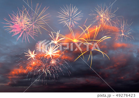 Fireworks in the evening sky Fireworks in the evening sky 49276423