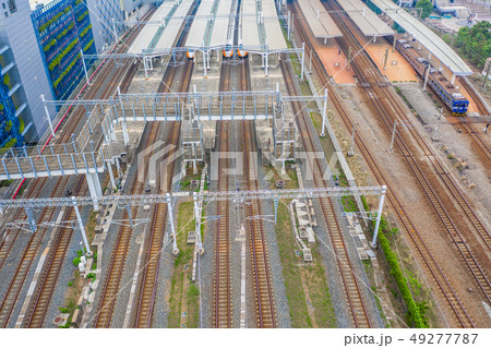 THSR Kaohsiung Station with train passing. 49277787