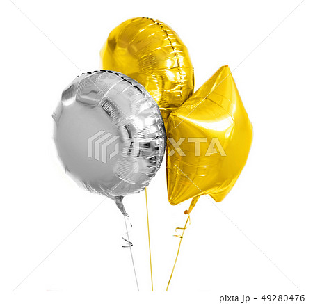 three gold and silver helium balloons on white 49280476