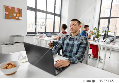 creative man with laptop working at office creative man with laptop working at office 49281651