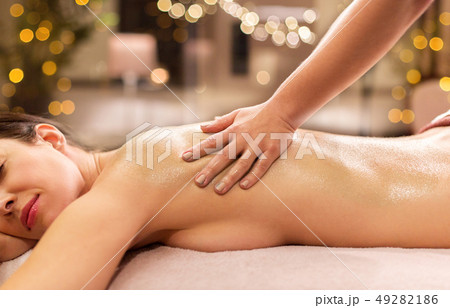 woman lying and having back massage at spa woman lying and having back massage at spa 49282186