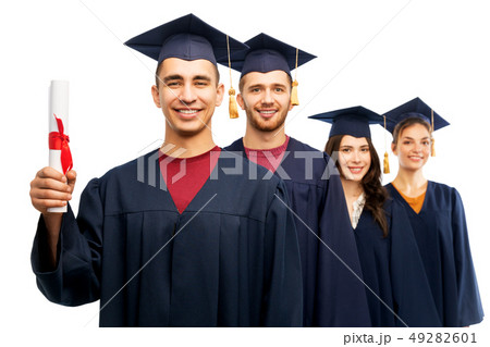 graduates in mortar boards with diploma 49282601
