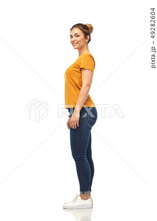 young woman or teenage girl in orange t-shirt 49282604