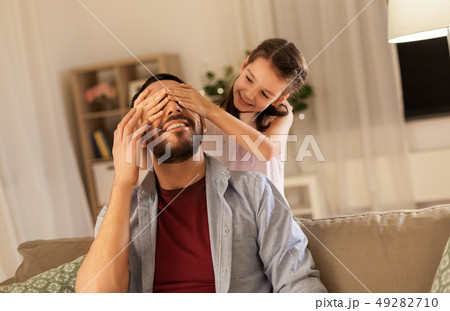 happy father and little daughter playing at home 49282710