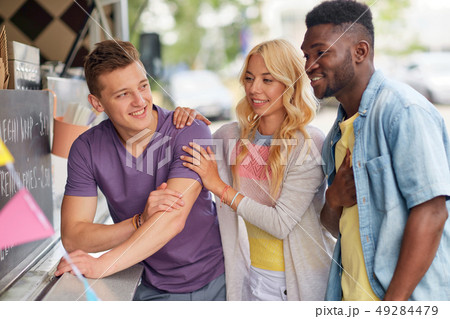 happy customers or friends at food truck happy customers or friends at food truck 49284479