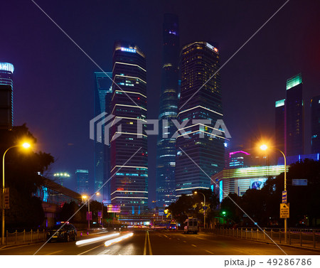 Shanghai, China - March 12, 2016: Shanghai Lujiazui Finance and Trade Zone of the modern city night Shanghai, China - March 12, 2016: Shanghai Lujiazui Finance and Trade Zone of the modern city night 49286786