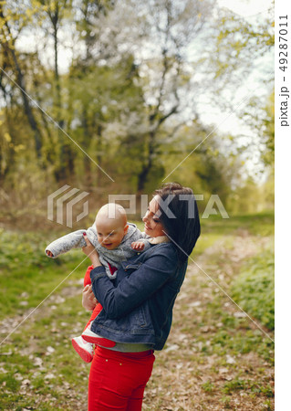Mother with son in a spring park 49287011