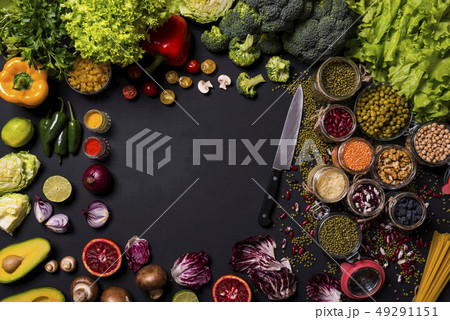 Various fruits and vegetables on black background. Copy Space. 49291151