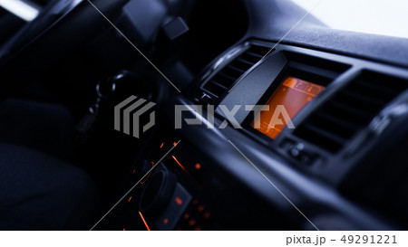 Buttons of radio, dashboard, climate control in car close up 49291221