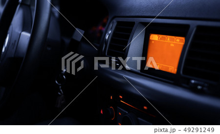 Buttons of radio, dashboard, climate control in car close up 49291249