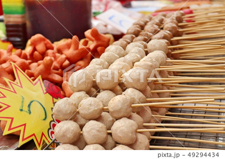 Fried meatballs and sausage at street food 49294434