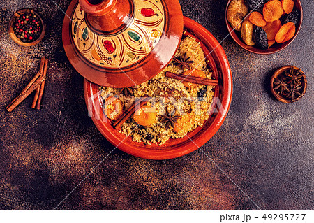 Traditional moroccan tajine of chicken with dried 49295727