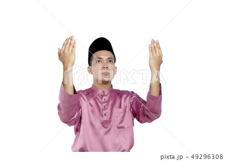 man with traditional clothing rising hand for pray man with traditional clothing rising hand for pray 49296308