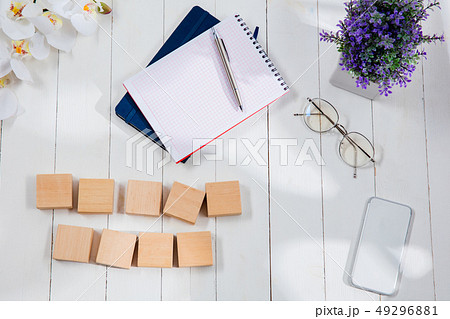 Message at wooden cubes on a desk background. 49296881