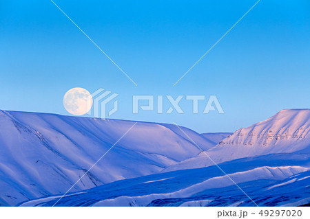 White snowy mountain with Moon, blue glacier 49297020