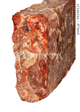Frozen block of beef on a white background. Frozen block of beef on a white background. 49298314