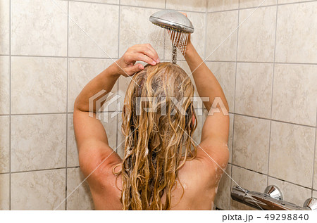 Woman taking a shower 49298840