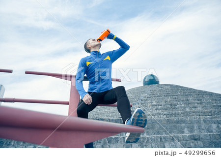 Man on city background at morning. Healthy lifestyle concept. 49299656